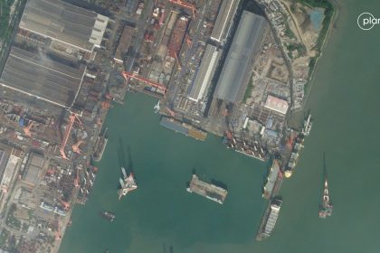 This satellite image captured on October 23, 2024, shows an entirely new class of Chinese vessel with a large open flight deck at a shipyard in the southeastern end of the country.