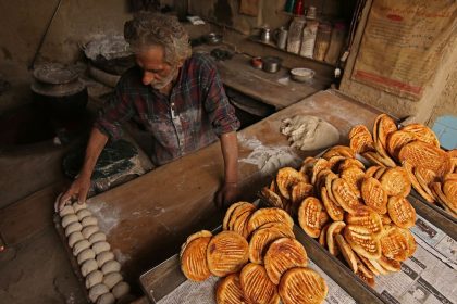 A baker prepares bread in Srinagar, Kashmir, India.