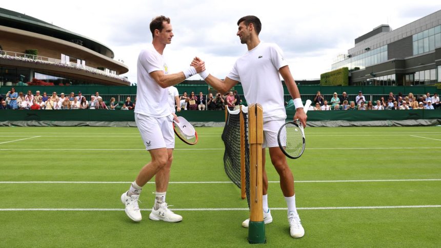 Andy Murray and Novak Djokovic shake hands after a practice session at Wimbledon in 2023.