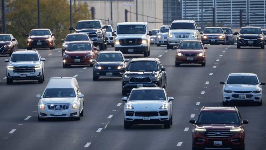 Traffic moves along Interstate 695 in Washington, DC during last Thanksgiving's travel season.