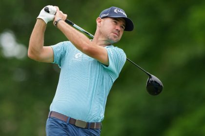 Harman plays his shot from the 18th tee during the third round of the Memorial Tournament at Muirfield Village Golf Club in June.