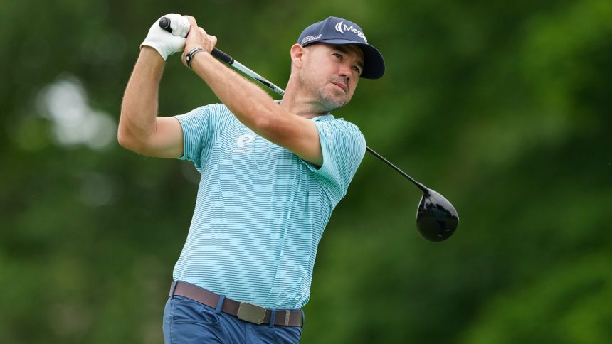 Harman plays his shot from the 18th tee during the third round of the Memorial Tournament at Muirfield Village Golf Club in June.