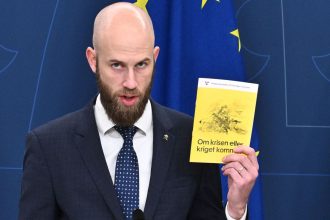 Sweden's Minister for Civil Defence, Carl-Oskar Bohlin, presents updated wartime guidance for residents, as European nations strengthen defense measures in the face of the conflict in Ukraine.