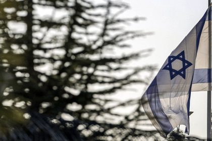 An Israeli flag flies outside the Prime Minister's Office in Jerusalem on October 22, 2024.