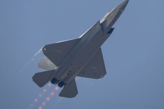 ZHUHAI, CHINA - NOVEMBER 12: A J-35A stealth fighter jet flies in the sky during the 15th China International Aviation and Aerospace Exhibition, or Airshow China 2024, on November 12, 2024 in Zhuhai, Guangdong Province of China. The Airshow China kicks off on November 12 in Zhuhai. (Photo by Chen Jimin/China News Service/VCG via Getty Images)