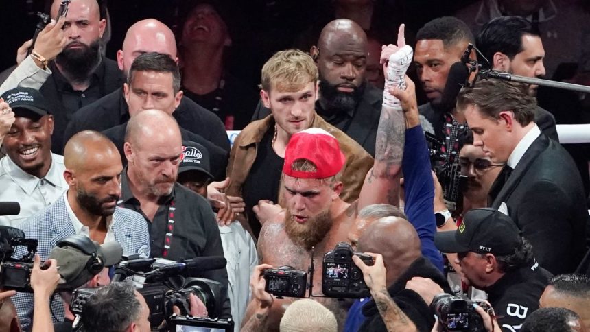 YouTuber and boxer Jake Paul celebrates winning the heavyweight boxing bout against US retired pro-boxer Mike Tyson at The Pavilion at AT&T Stadium in Arlington, Texas, on November 15, 2024.