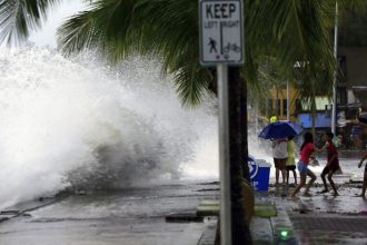 A super typhoon has made landfall in the Philippines. It could have a "potentially catastrophic" impact, the state weather forecaster warned, with millions of people at risk from storm surges.