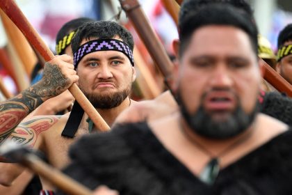 Members of the Maori community march in a protest rally to criticise the government for its policies affecting the Indigenous Mori population in Wellington on November 19, 2024.