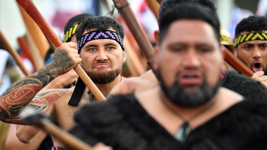 Members of the Maori community march in a protest rally to criticise the government for its policies affecting the Indigenous Mori population in Wellington on November 19, 2024.