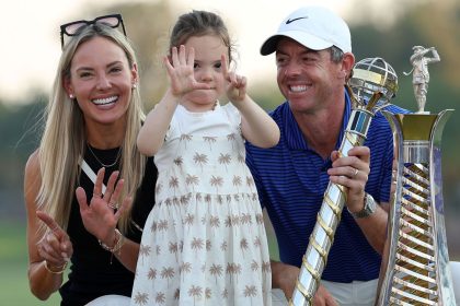 Rory McIlroy celebrates with his wife and daughter after winning his sixth Race to Dubai title.