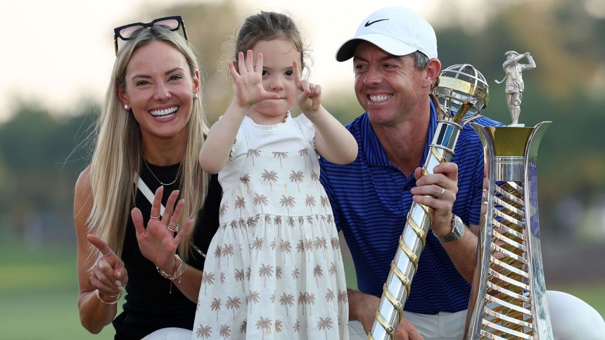 Rory McIlroy celebrates with his wife and daughter after winning his sixth Race to Dubai title.