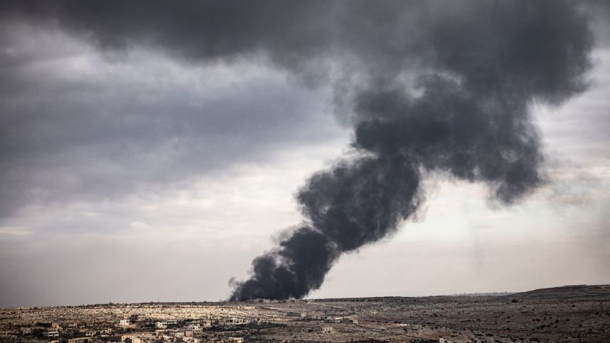 Smoke rises from clashes between Syrian rebels and the regime in the Aleppo countryside on Wednesday.