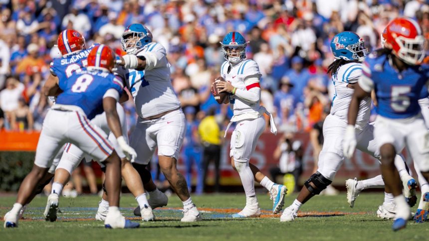 Mississippi Rebels quarterback Jaxson Dart looks for a pass during his team's loss against the Florida Gators.