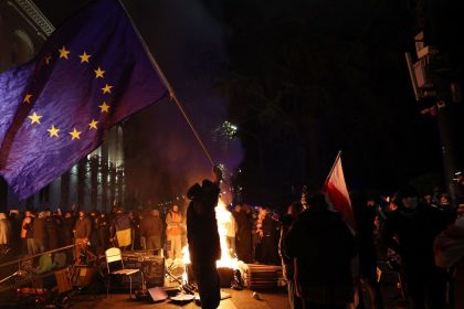 A protester waves a European Union flag during a demonstration in Tbilisi, Georgia, on Thursday.