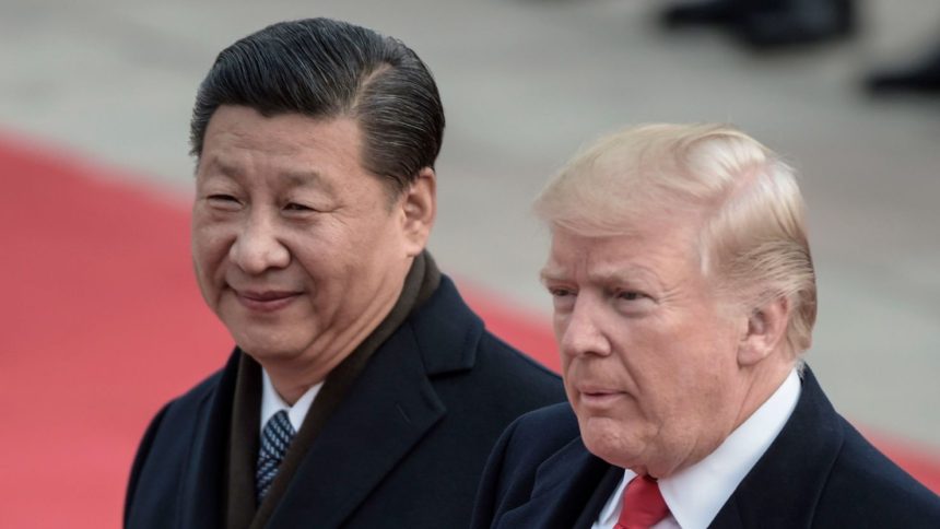 Chinese leader Xi Jinping and then-US President Donald Trump attend a welcome ceremony at the Great Hall of the People in Beijing on November 9, 2017.