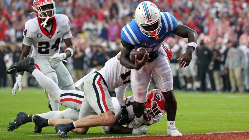 Ole Miss running back Ulysses Bentley IV scores a touchdown during the first half against the Georgia Bulldogs at Vaught-Hemingway Stadium.