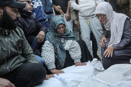 Mourners attend the funeral of Palestinians killed in an Israeli strike, at Al-Aqsa Martyrs Hospital in Deir Al-Balah, in the central Gaza Strip on Thursday.