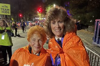 Judith Som, right, was the oldest woman to finish the New York City Marathon this year.