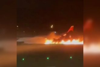 A still from a video by Russian state media RIA Novosti shows a passenger plane on fire at Turkey's Antalya Airport on Sunday, November 24.