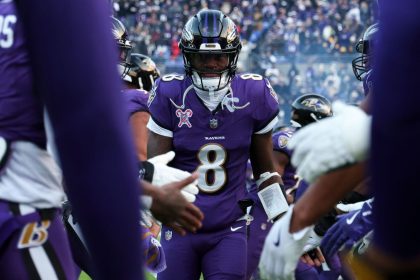 Baltimore Ravens quarterback Lamar Jackson runs onto the field ahead of the game against the Pittsburgh Steelers.