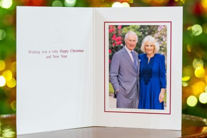 King Charles and Queen Camilla have selected a photo taken in the garden at Buckingham Palace for their Christmas card this year.