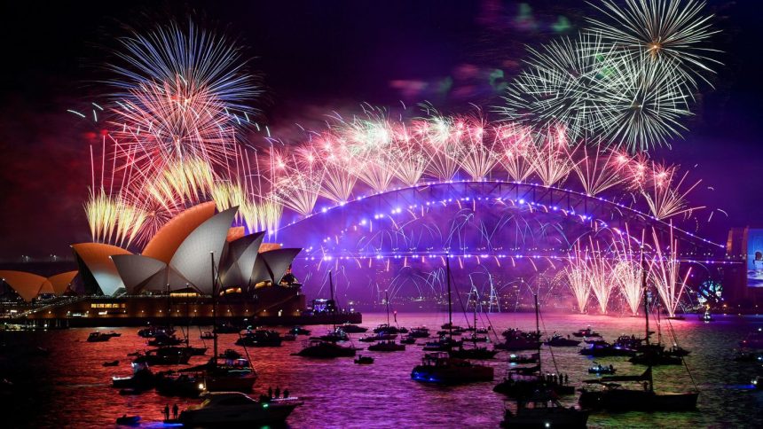 Fireworks explode over Sydney Harbour during New Year's Eve celebrations in Sydney, Australia, on January 1, 2022.