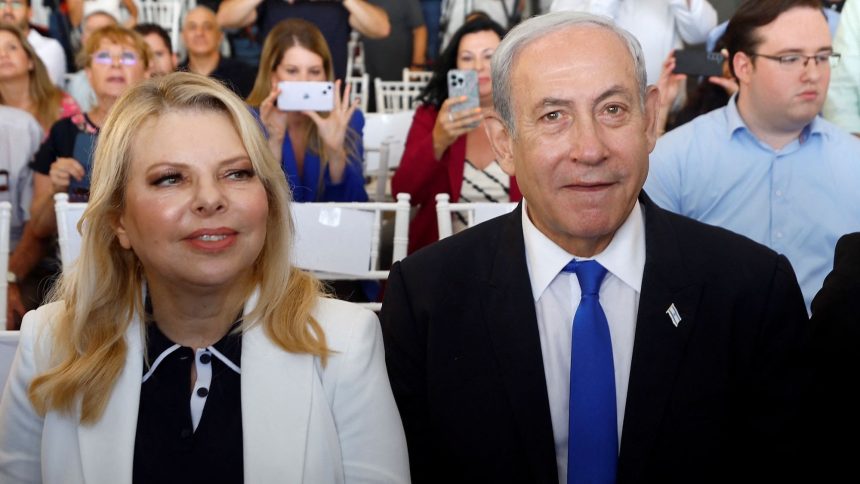 Israeli Prime Minister Benjamin Netanyahu, flanked by his wife Sara Netanyahu, attends an inauguration event for Israel's new light rail line for the Tel Aviv metropolitan area, in Petah Tikva, Israel, August 17, 2023.