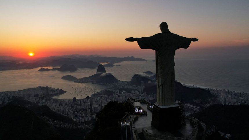 Christ the Redeemer is photographed at sunrise in Rio de Janeiro on May 17.