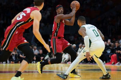 Miami forward Jimmy Butler (middle) will not be traded, according to Heat president Pat Riley.