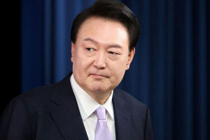 South Korean President Yoon Suk Yeol arrives for a press conference at the Presidential Office in Seoul, South Korea, on November 7.