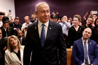 Israeli Prime Minister Benjamin Netanyahu appears in a Tel Aviv courtroom on December 10, 2024 to defend himself against corruption charges.