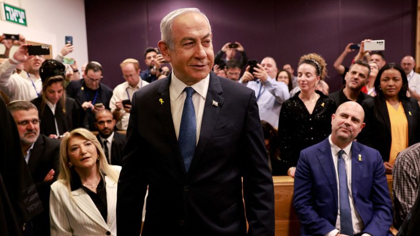 Israeli Prime Minister Benjamin Netanyahu appears in a Tel Aviv courtroom on December 10, 2024 to defend himself against corruption charges.