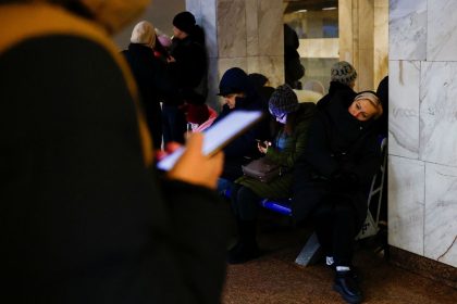 People take shelter inside a metro station during a Russian military strike in Kyiv, Ukraine, on December 13.