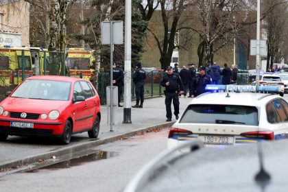 Police officers respond to a knife attack at a primary school in Zagreb, Croatia, on Friday.