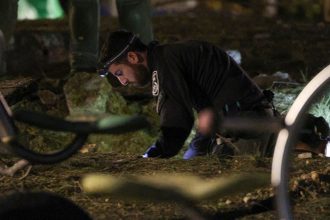 Israeli emergency services work at the scene of a missile strike that, according to Israel’s military, was launched from Yemen and landed in Jaffa, south of Tel Aviv, Israel, December 21, 2024.