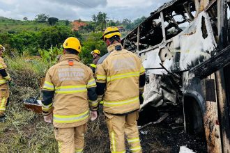 Firefighters attend to a traffic accident after a packed bus collided with a truck, at the Fernao Dias national highway, near Teofilo Otoni, Brazil, December 21, 2024. Belo Horizonte Military Fire Department/­Handout via REUTERS ATTENTION EDITORS - THIS IMAGE WAS PROVIDED BY A THIRD PARTY