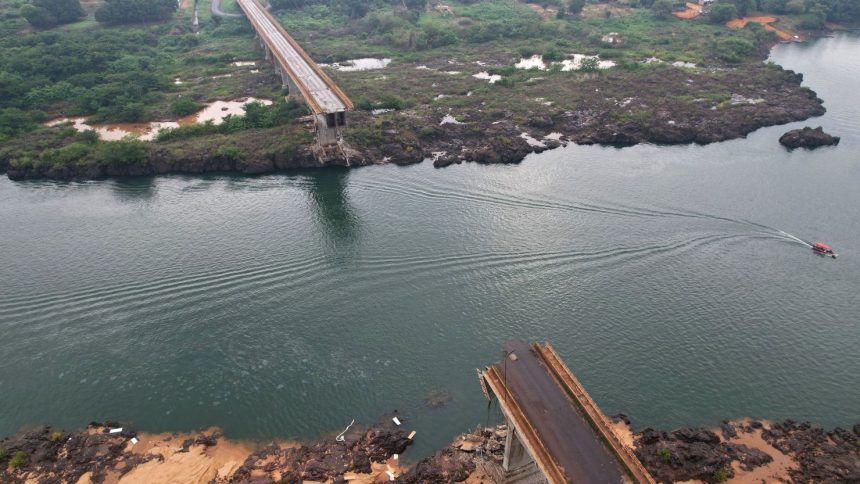 A drone view shows a collapsed bridge between Aguiarnopolis and Estreito, Brazil on December 24, 2024.