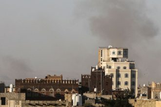 Smoke rises near Sana'a International Airport, after Israeli strikes hit the capital Sana'a, in Yemen, on Thursday.