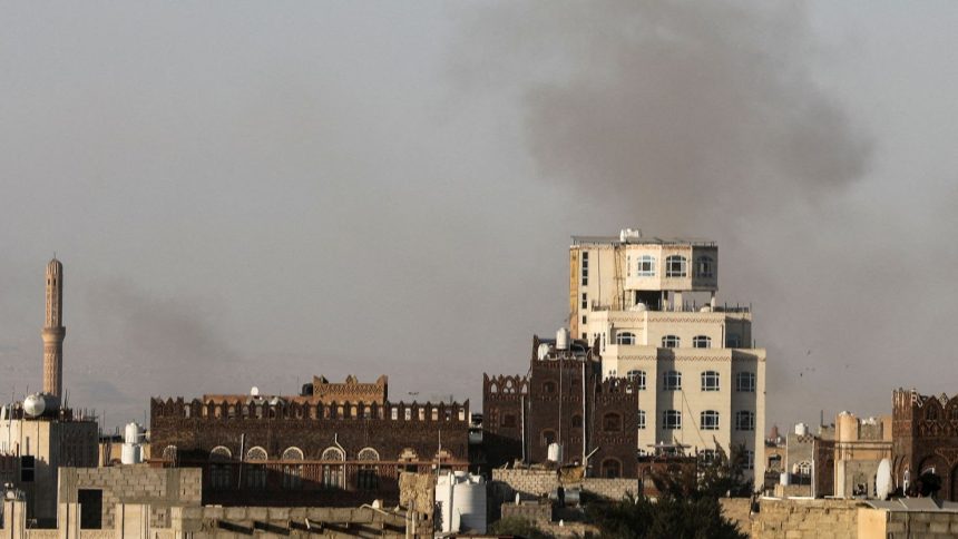 Smoke rises near Sana'a International Airport, after Israeli strikes hit the capital Sana'a, in Yemen, on Thursday.