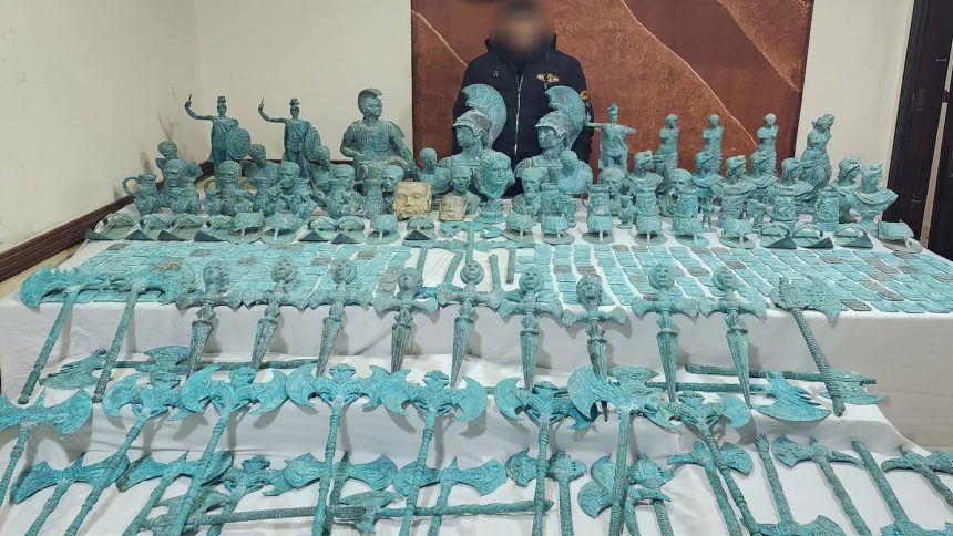 Hundreds of artifacts were seized by Egyptian authorities from two alleged traffickers who had dove to steal the antiquities.