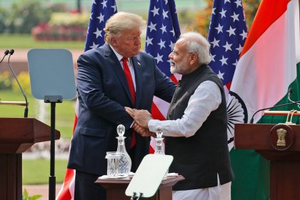 Then US President Donald Trump and Indian Prime Minister Narendra Modi shake hands after giving a joint statement in New Delhi, India, on February 25, 2020.