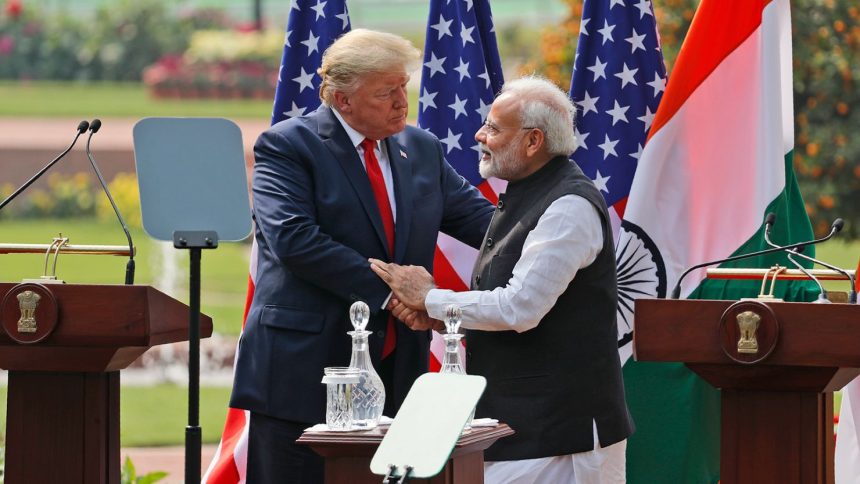 Then US President Donald Trump and Indian Prime Minister Narendra Modi shake hands after giving a joint statement in New Delhi, India, on February 25, 2020.