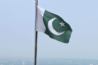 Pakistan's national flag flies over a lookout in Islamabad, Pakistan, on July 27, 2022.