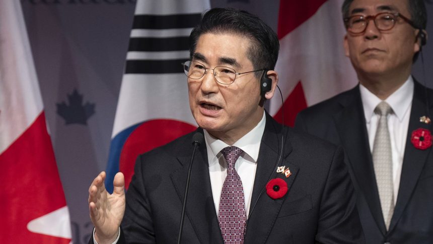 FILE - South Korea's Foreign Minister Cho Tae-yul, right, looks on as South Korea's Defense Minister Kim Yong Hyun speaks during a news conference in Ottawa, Ontario, on Nov. 1, 2024. (Adrian Wyld/The Canadian Press via AP, File)