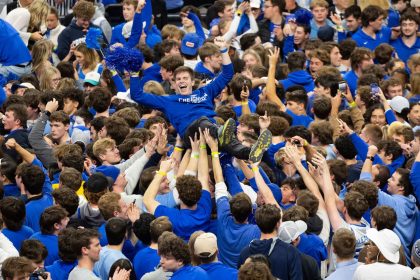 Creighton fans celebrate their team's 76-63 win against Kansas, the program's second win over No. 1 opposition in less than a year.