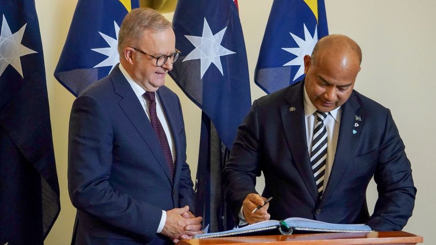 Australian Prime Minister Anthony Albanese (left) and Nauru President David Adeang (right) at the Australian Parliament House in Canberra on December 9, 2024.