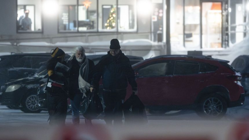 Environmental activist Paul Watson, center, is released from prison in Nuuk, Greenland, on December 17, 2024.