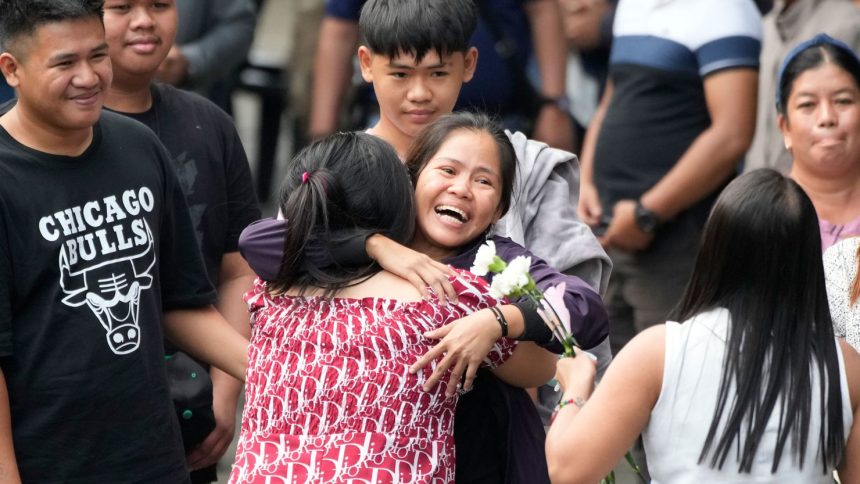 Mary Jane Veloso, center, is reunited with her family as she arrives at the Correctional Institution for Women in Mandaluyong, Philippines, on December 18, 2024.