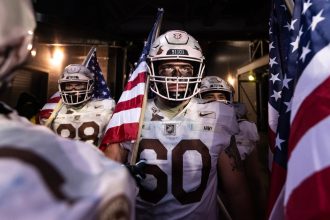 Connor Finucane of the Army Black Knights prepares to take the field before the start of a game against the Navy Midshipmen at MetLife Stadium on December 11, 2021 in East Rutherford, New Jersey.