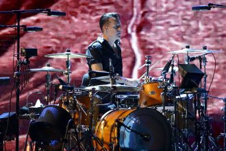 Larry Mullen Jr. of U2 performs at the National Stadium in Singapore on November 30, 2019.